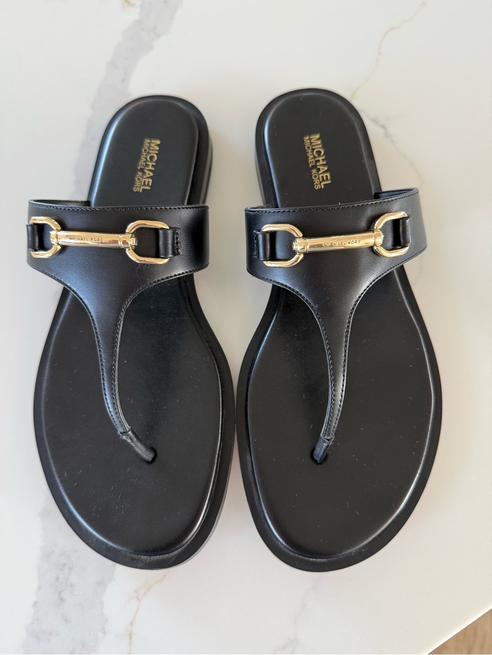 MICHAEL Michael Kors Black Leather Thong Sandals with Gold-Tone Horsebit